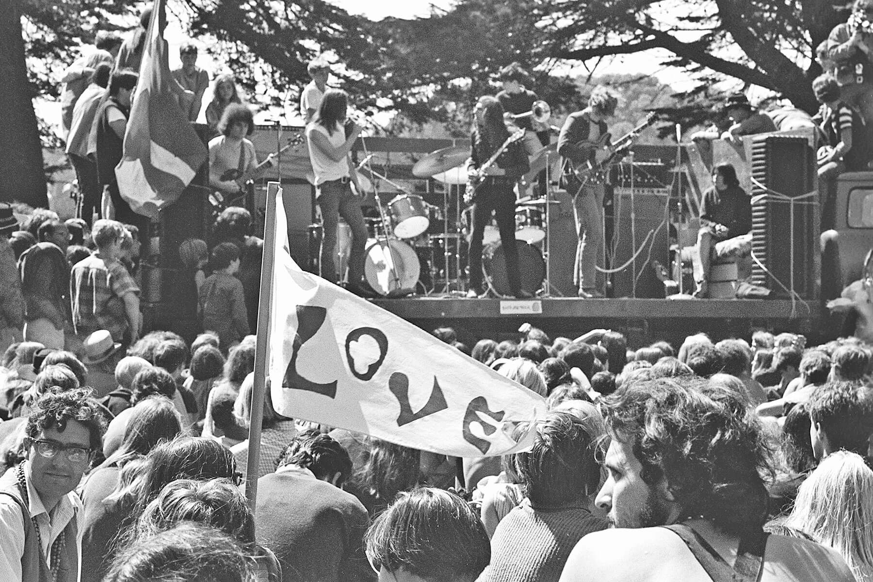 Hippies watching a band