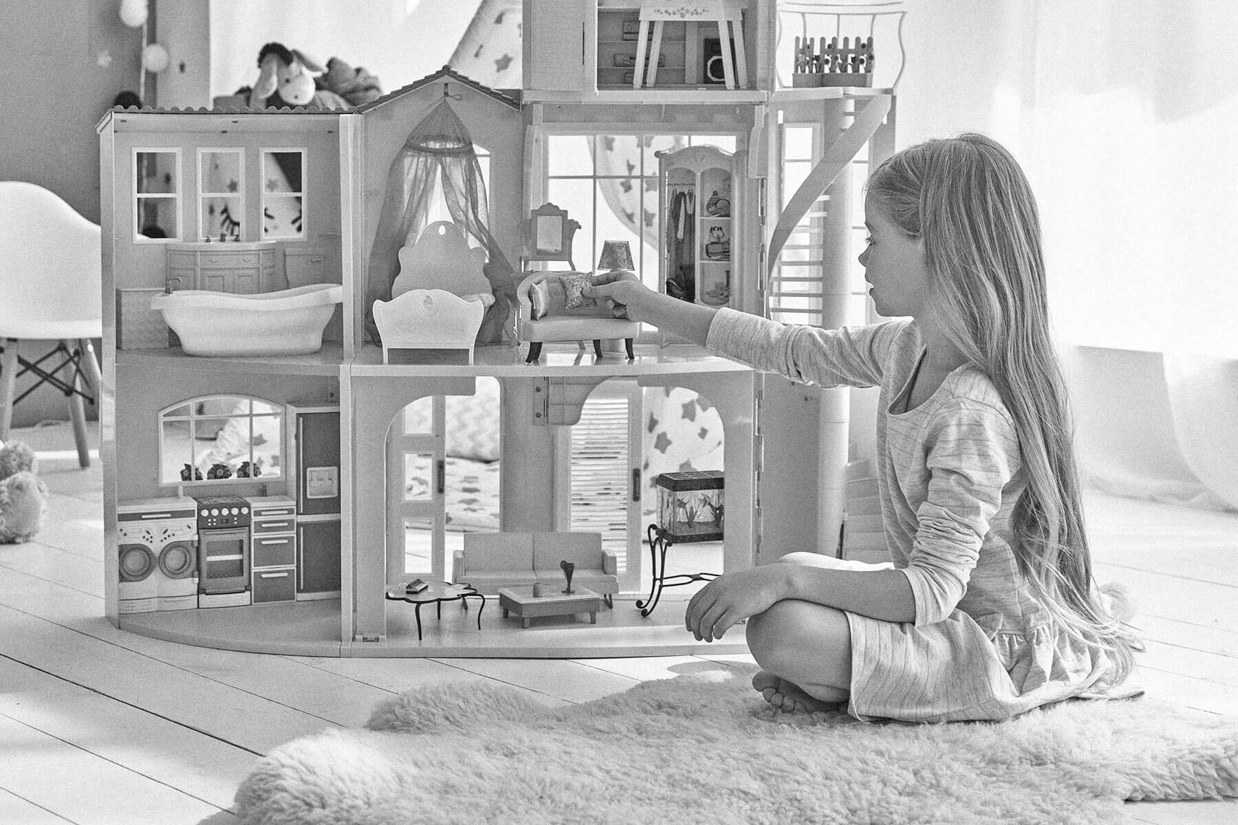 Playing with a dollhouse