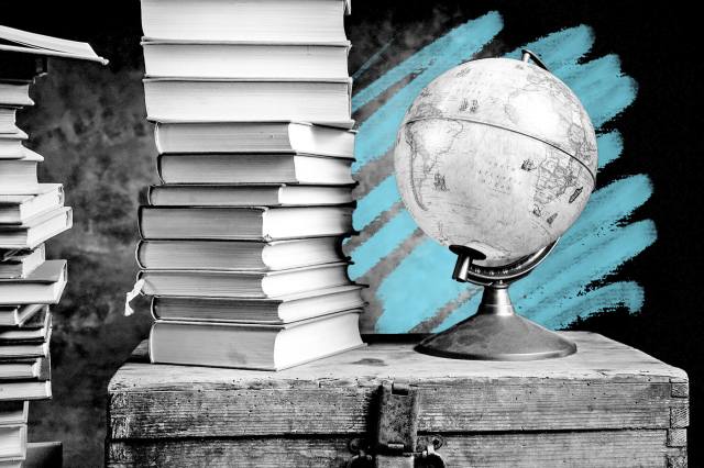 Vintage books with globe