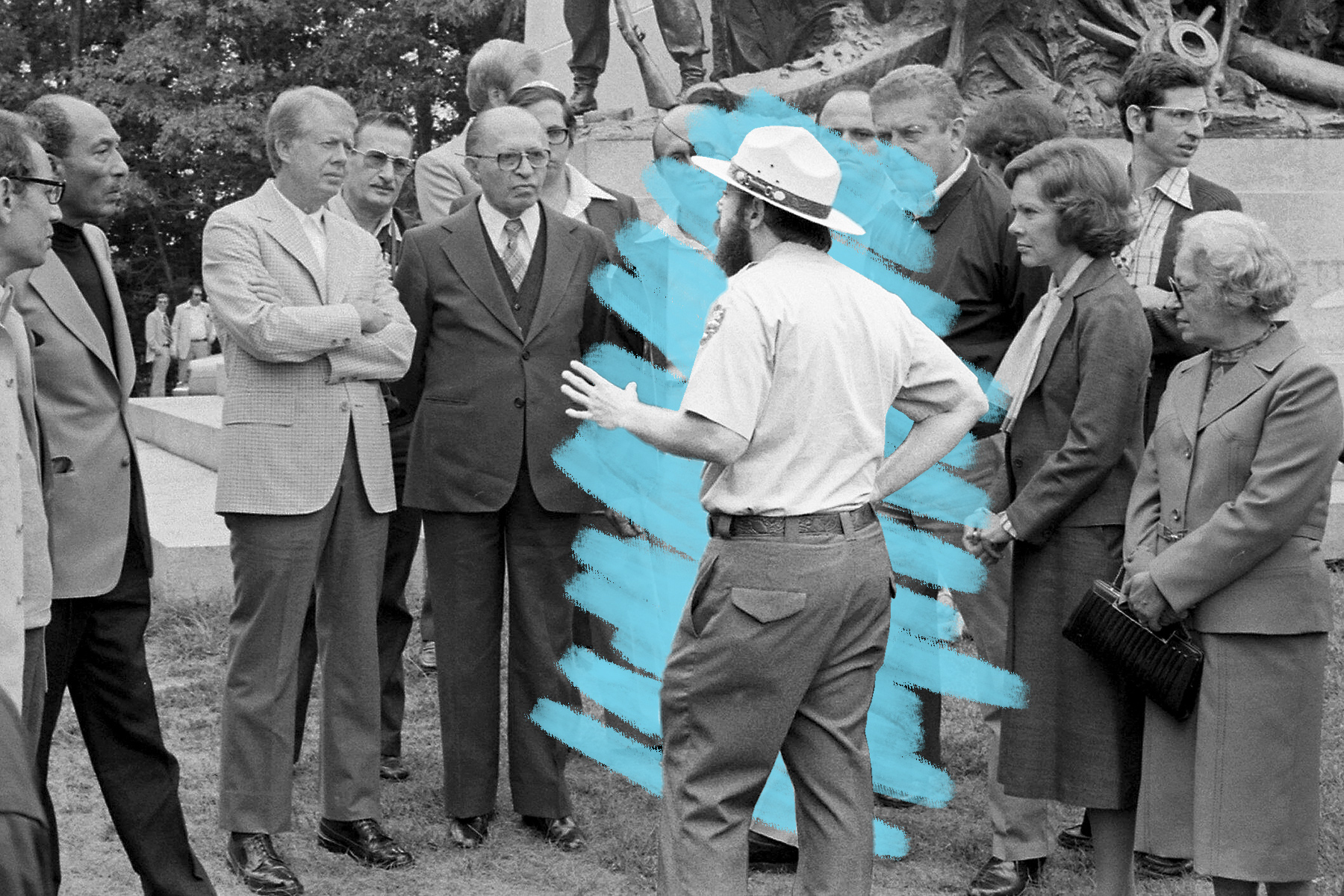 Camp David attendees listen to a tour guide during a trip to the Gettysburg National Military Park, 1978
